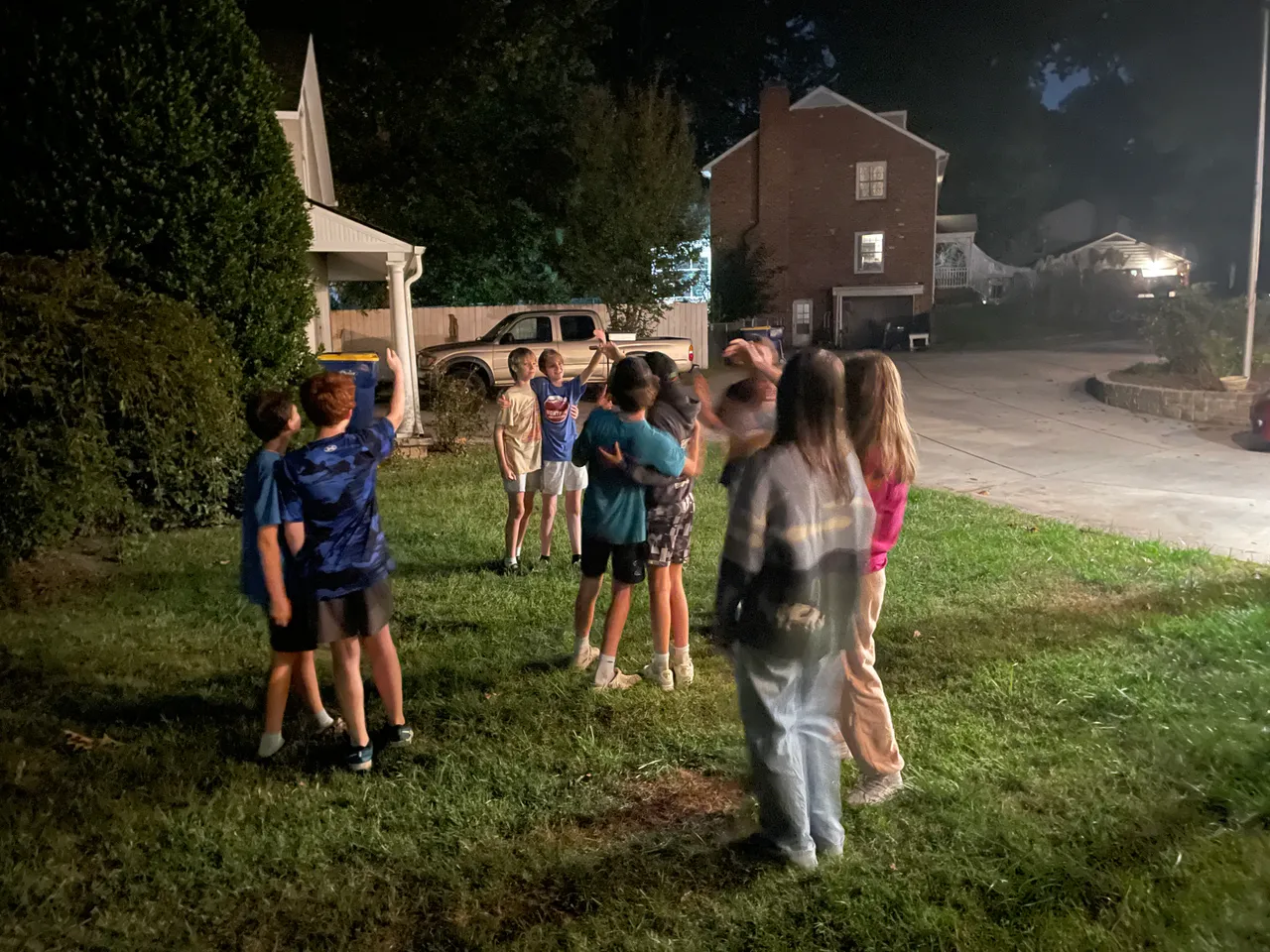youth playing in yard
